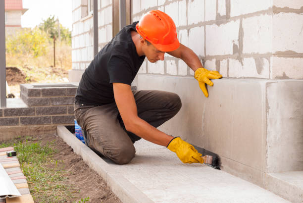 Waterproofing professionals working in Westport, IN
